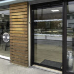 Modern Automatic Sliding Glass Door at a Fromagerie (Cheese Shop)